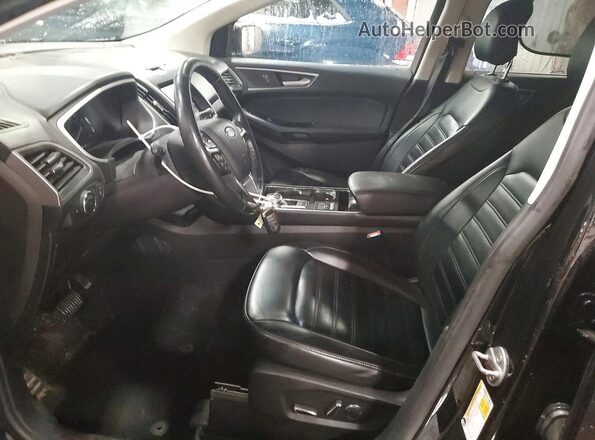2FMPK3J92KBB98519 2019 FORD EDGE Черный Вид салона спереди