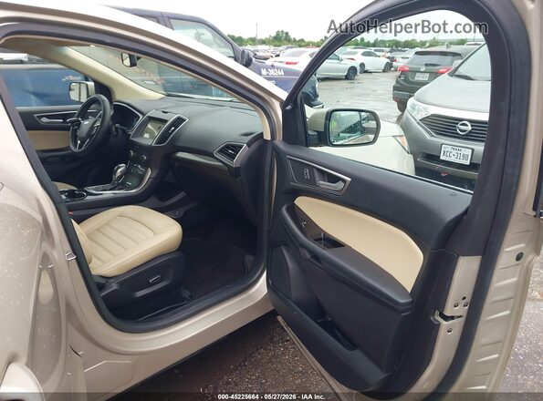 2FMPK3J93HBB31226 2017 FORD EDGE Золотой Вид салона спереди