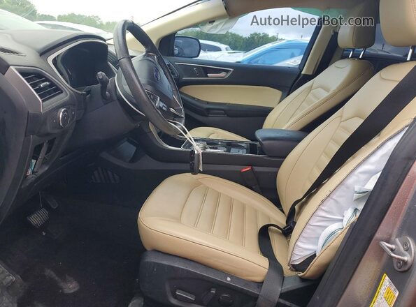 2FMPK3J95LBB59599 2020 FORD EDGE Серебряный Вид салона спереди