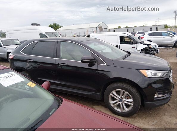 2FMPK3J98KBB24909 2019 FORD EDGE Black Rear interior view