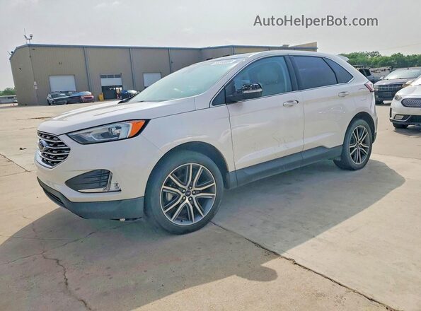 2FMPK3K95KBB85455 2019 FORD EDGE Белый Передняя левая четверть