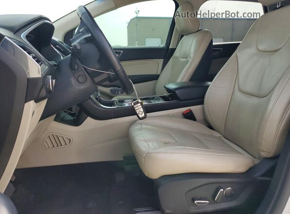 2FMPK3K95KBB85455 2019 FORD EDGE Белый Вид салона спереди