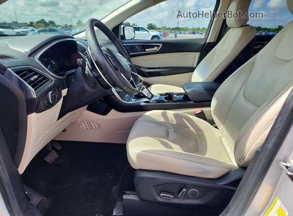 2FMPK3K96JBB36330 2018 FORD EDGE Серебряный Вид салона спереди