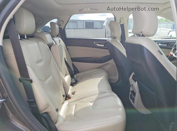 2FMPK3K98HBB82333 2017 FORD EDGE Black Vista interior trasera