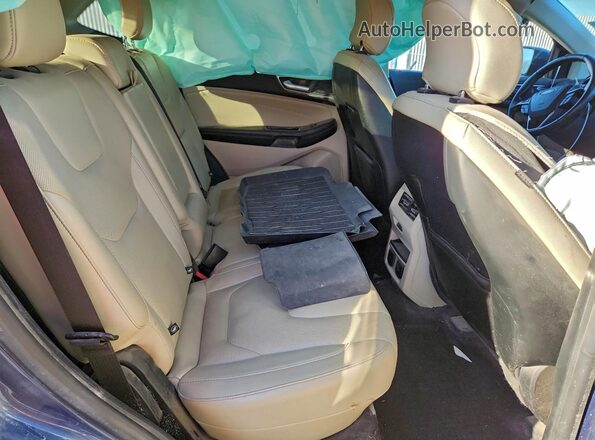 2FMPK3K98KBB21460 2019 FORD EDGE Blue Widok wnętrza z tyłu