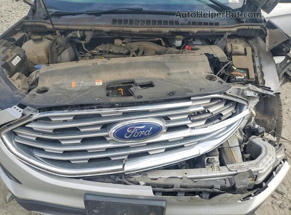 2FMPK3K98KBC37368 2019 FORD EDGE Серебряный Вид задней части салона