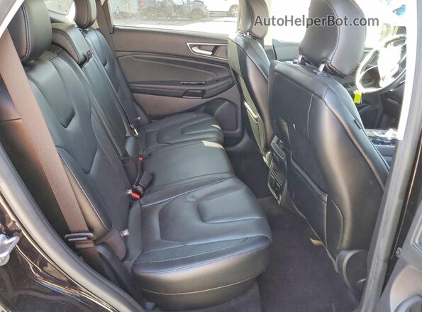 2FMPK3K99KBC43681 2019 FORD EDGE Черный Вид задней части салона
