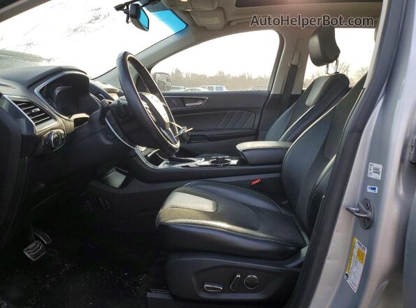 2FMPK4AP8HBC56324 2017 FORD EDGE Серебряный Вид салона спереди