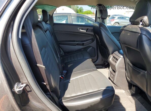 2FMPK4J81JBC57281 2018 FORD EDGE Серый Вид задней части салона