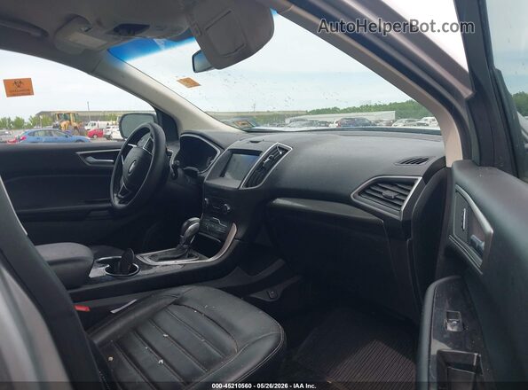 2FMPK4J8XHBC20336 2017 FORD EDGE Серебряный Вид салона спереди