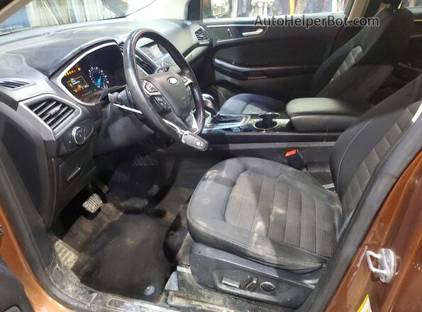 2FMPK4J90HBC06907 2017 FORD EDGE Оранжевый Вид салона спереди