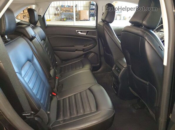 2FMPK4J90RBA46996 2024 FORD EDGE Черный Вид задней части салона