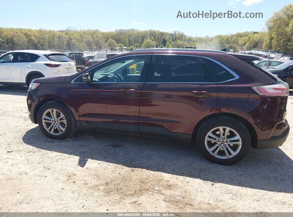 2FMPK4J93LBB08043 2020 FORD EDGE Burgundy Rear interior view
