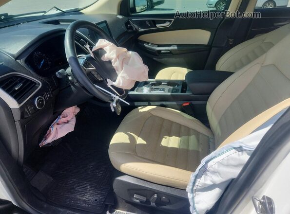 2FMPK4J93PBA32989 2023 FORD EDGE Белый Вид салона спереди