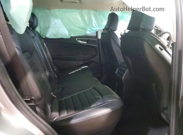 2FMPK4J93RBB12828 2024 FORD EDGE Silver Rear interior view