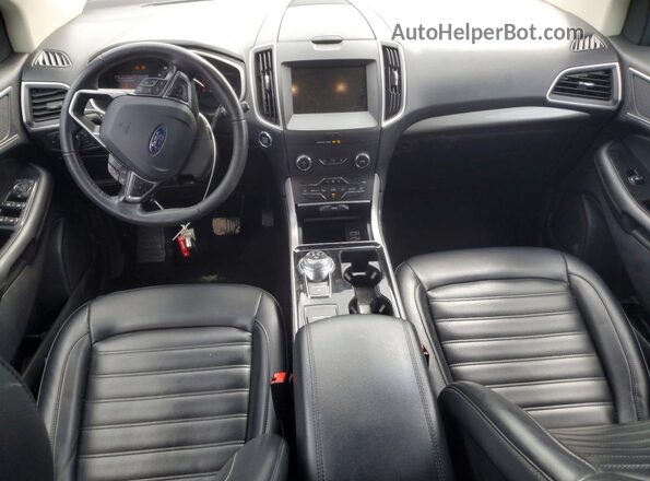 2FMPK4J94KBC75252 2019 FORD EDGE Бордовый Вид панели приборов