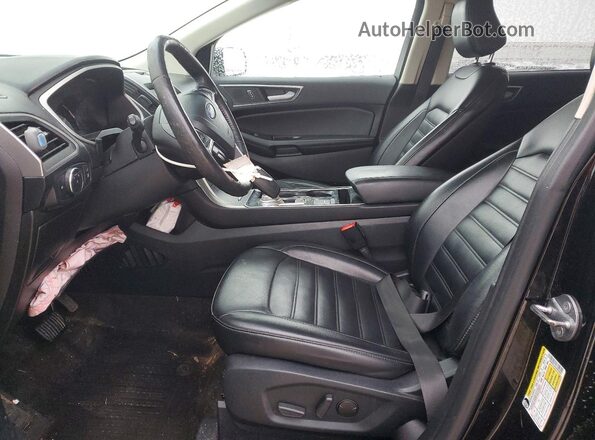 2FMPK4J94LBB58885 2020 FORD EDGE Черный Вид салона спереди