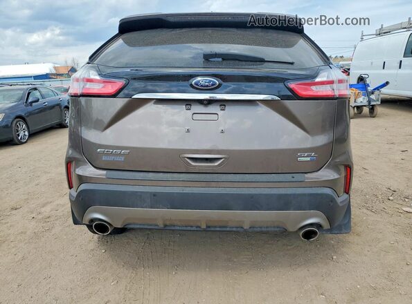 2FMPK4J95KBB79663 2019 FORD EDGE Tan Vista trasera