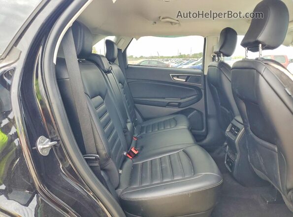 2FMPK4J95RBA57122 2024 FORD EDGE Black Widok wnętrza z tyłu