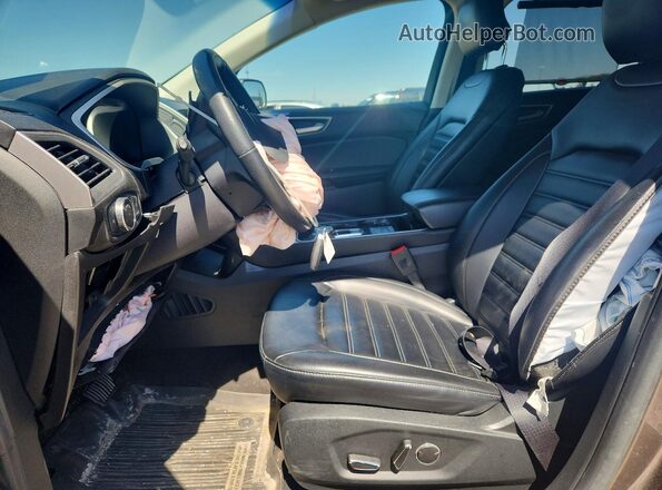 2FMPK4J96KBC18518 2019 FORD EDGE Желто-коричневый Вид салона спереди