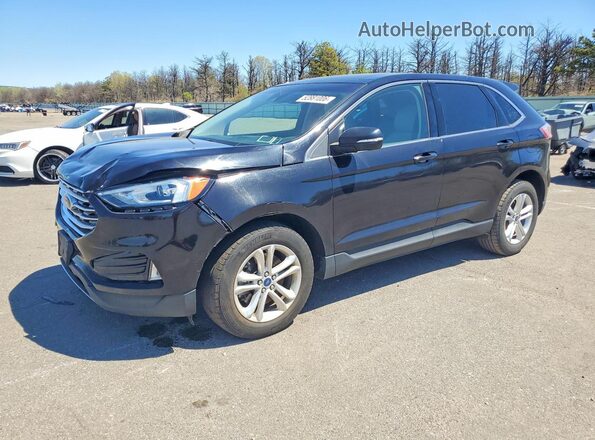 2FMPK4J96KBC74796 2019 FORD EDGE Black Vista tres cuartos delantera izquierda