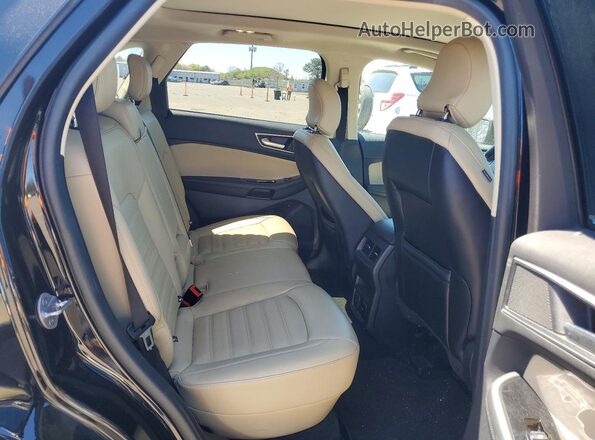 2FMPK4J96KBC74796 2019 FORD EDGE Black Vista interior trasera