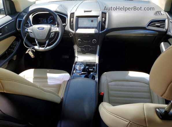 2FMPK4J97KBB73797 2019 FORD EDGE Белый Вид панели приборов