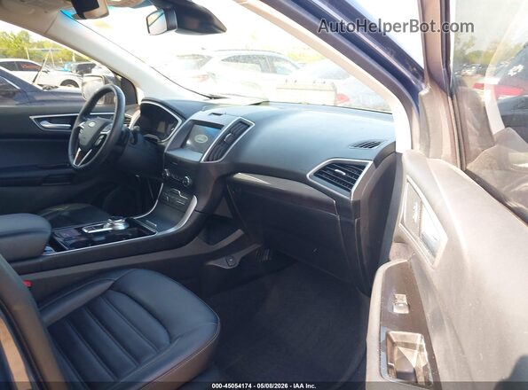 2FMPK4J97KBC45257 2019 FORD EDGE Синий Вид салона спереди