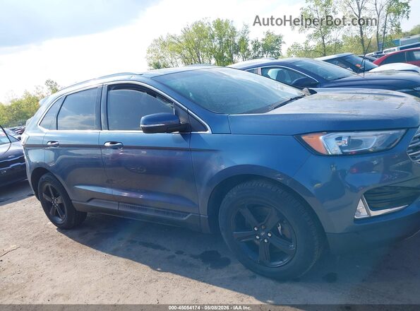 2FMPK4J97KBC45257 2019 FORD EDGE Синий Вид задней части салона