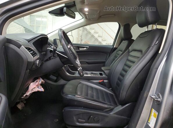 2FMPK4J97NBA28392 2022 FORD EDGE Серебряный Вид салона спереди