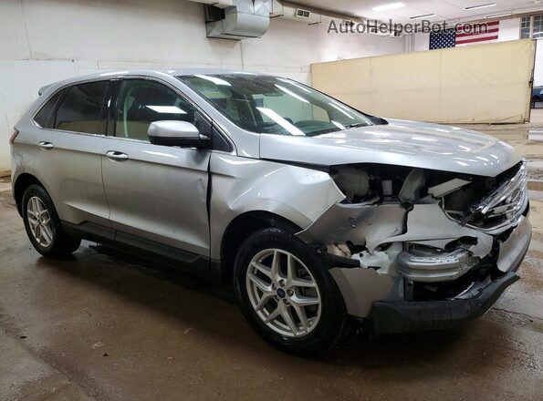 2FMPK4J97NBA28392 2022 FORD EDGE Серебряный Передняя правая четверть