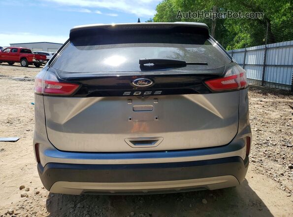 2FMPK4J97NBA44625 2022 FORD EDGE Серебряный Вид сзади