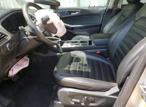2FMPK4J97NBA44625 2022 FORD EDGE Серебряный Вид салона спереди