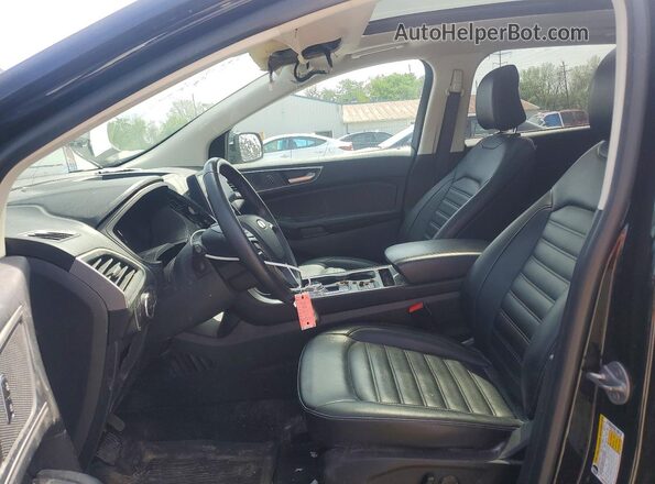 2FMPK4J98PBA12866 2023 FORD EDGE Черный Вид салона спереди