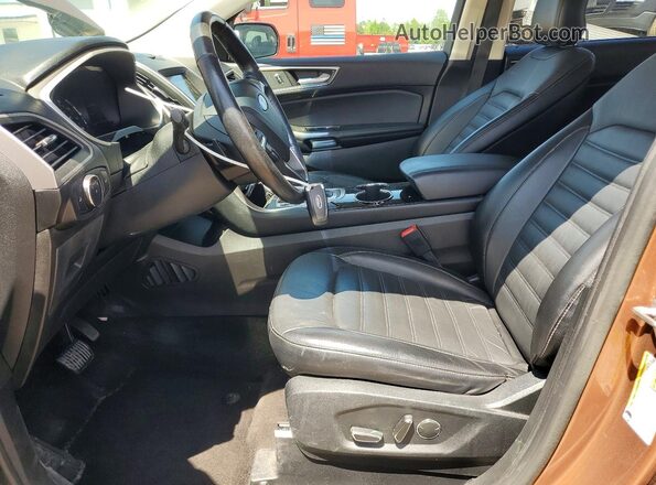 2FMPK4J99HBC59962 2017 FORD EDGE Коричневый Вид салона спереди