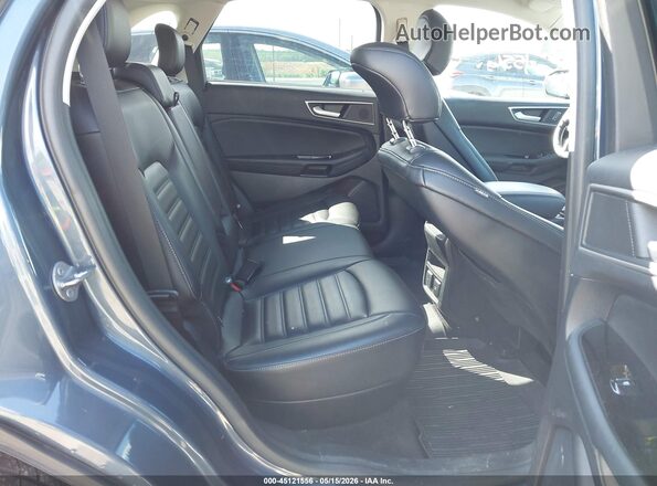 2FMPK4J99KBB03136 2019 FORD EDGE Blue Widok naklejki z numerem VIN