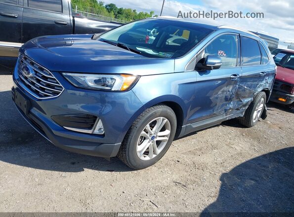 2FMPK4J99KBB03136 2019 FORD EDGE Blue Przód lewy
