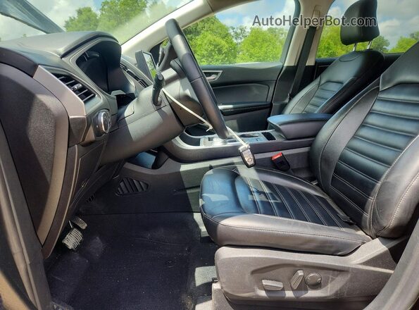 2FMPK4J99RBA03371 2024 FORD EDGE Черный Вид салона спереди