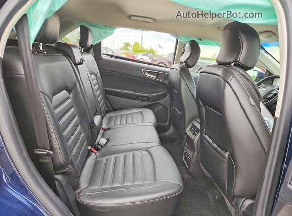 2FMPK4J9XHBC68038 2017 FORD EDGE Синий Вид задней части салона
