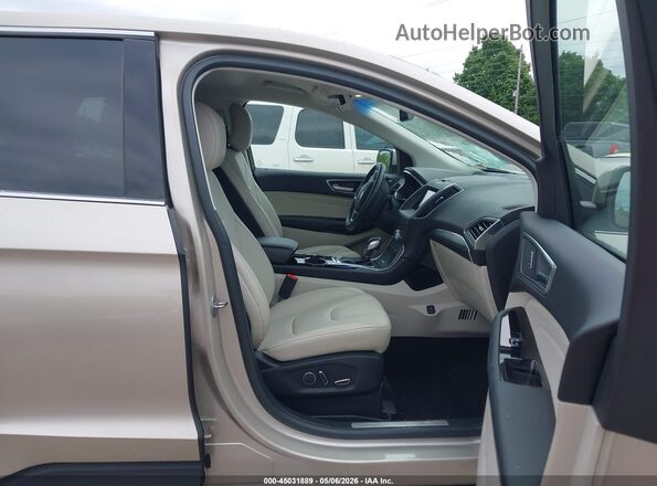 2FMPK4K82HBB17541 2017 FORD EDGE Champagne Вид салона спереди