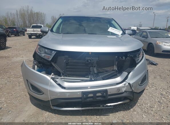 2FMPK4K91JBB74859 2018 FORD EDGE Серебряный Вид задней части салона