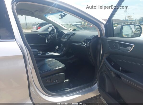2FMPK4K91JBB74859 2018 FORD EDGE Серебряный Вид салона спереди