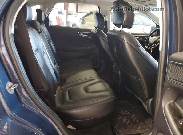 2FMPK4K94KBC33243 2019 FORD EDGE Blue Սալոնի հետևի տեսք