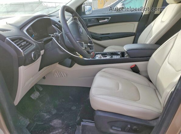 2FMPK4K95LBB56819 2020 FORD EDGE Золотой Вид салона спереди
