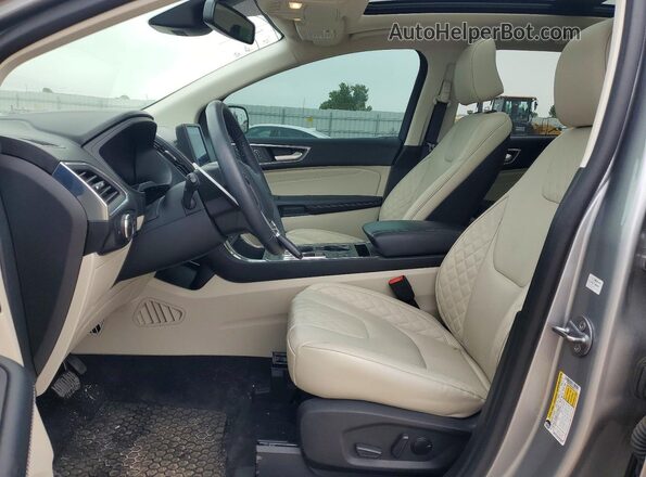 2FMPK4K95RBA31747 2024 FORD EDGE Серебряный Вид салона спереди