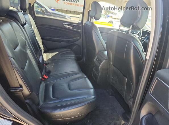 2FMPK4K98HBB12157 2017 FORD EDGE Черный Вид задней части салона