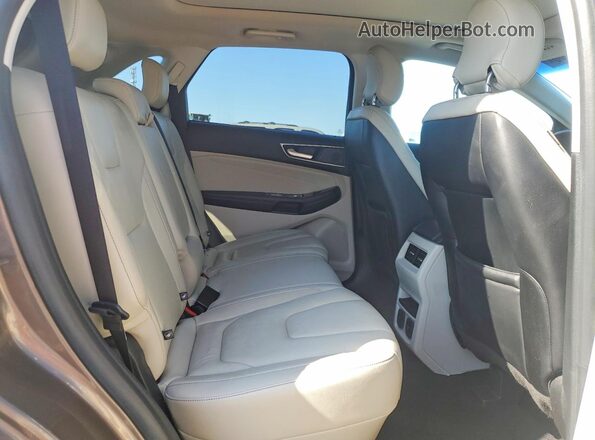 2FMPK4K98KBB67232 2019 FORD EDGE Brown Widok wnętrza z tyłu