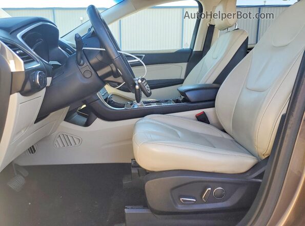 2FMPK4K98KBB67232 2019 FORD EDGE Brown Widok wnętrza z przodu