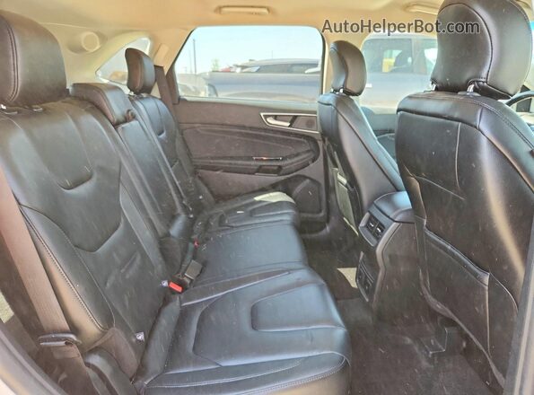 2FMPK4K99KBC62401 2019 FORD EDGE White Vista de los asientos traseros