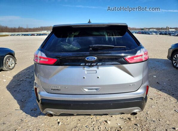 2FMPK4K99NBA32121 2022 FORD EDGE Серебряный Вид сзади
